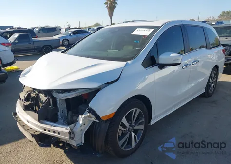 2021 Honda Odyssey Touring z USA, uszkodzony, nr VIN 5FNRL6H82MB000486